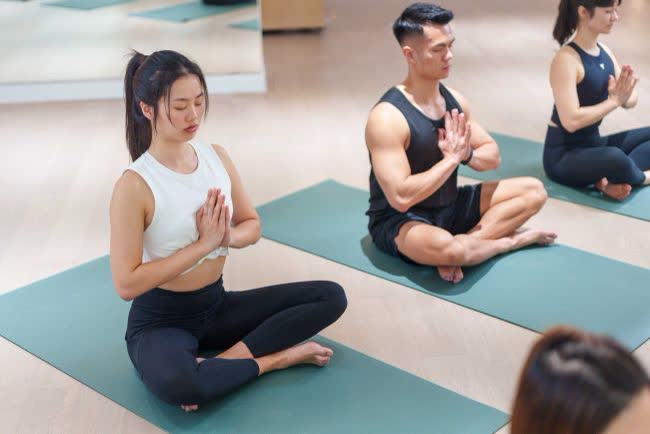 A welcoming group yoga class
